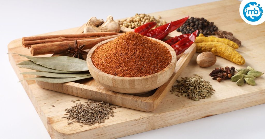 Indian spices displayed on a wooden board