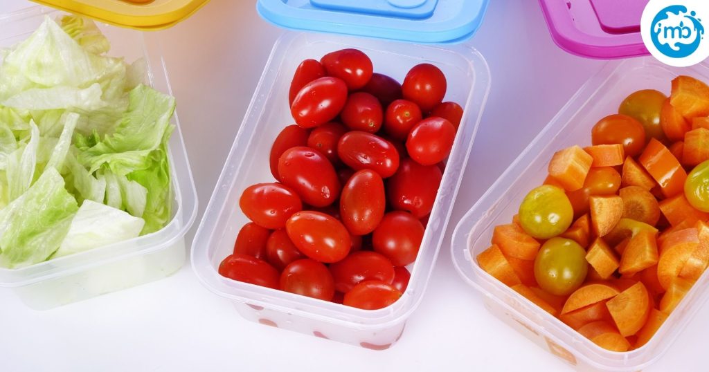 Vegetables cut and kept in plastic storage containers without lids