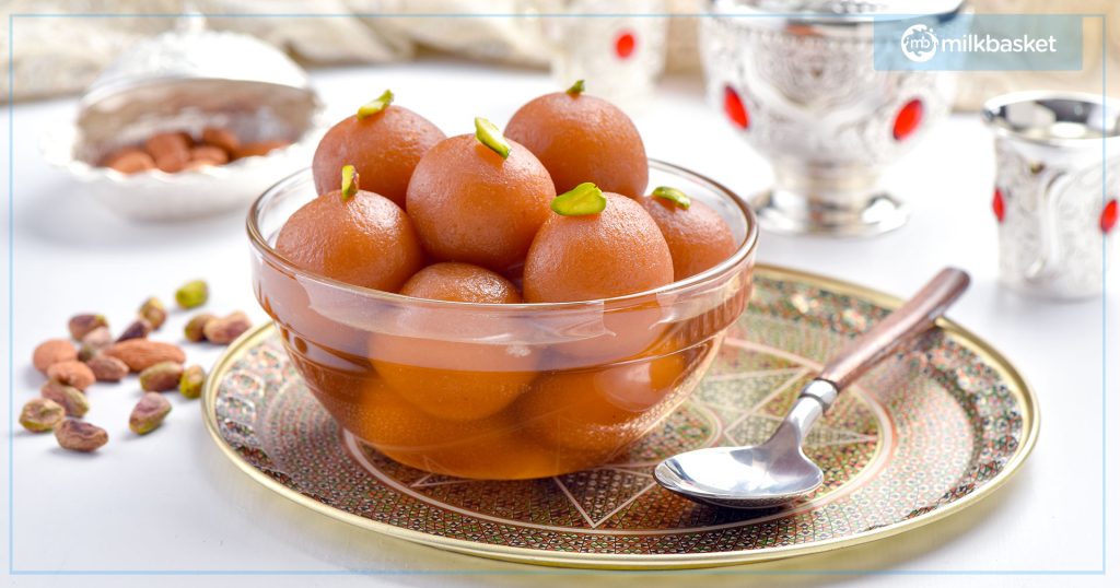 Gulab Jamun served in a glass bowl for the festival of Janmashtami