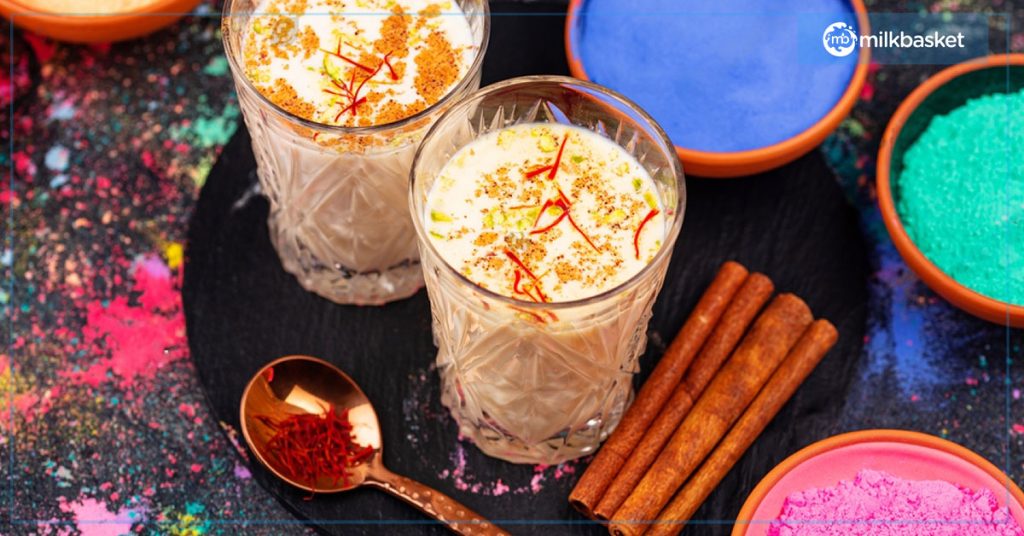 thandai is a milk-based indian drink made with milk, ground nuts, cinnamon, saffron and khas mixed together