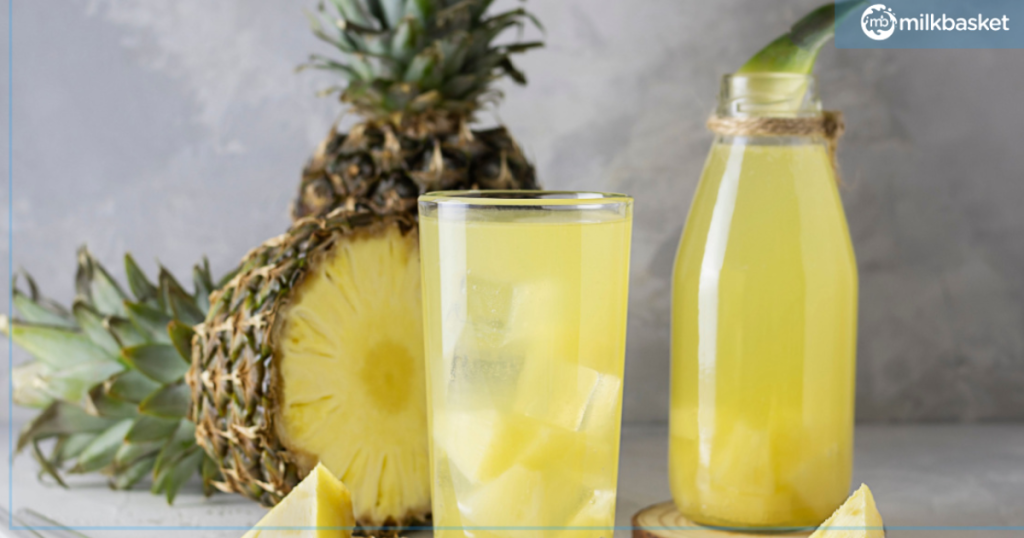 Fresh Pineapple Agua Fresca with pineapple slices, a refreshing summer drink.