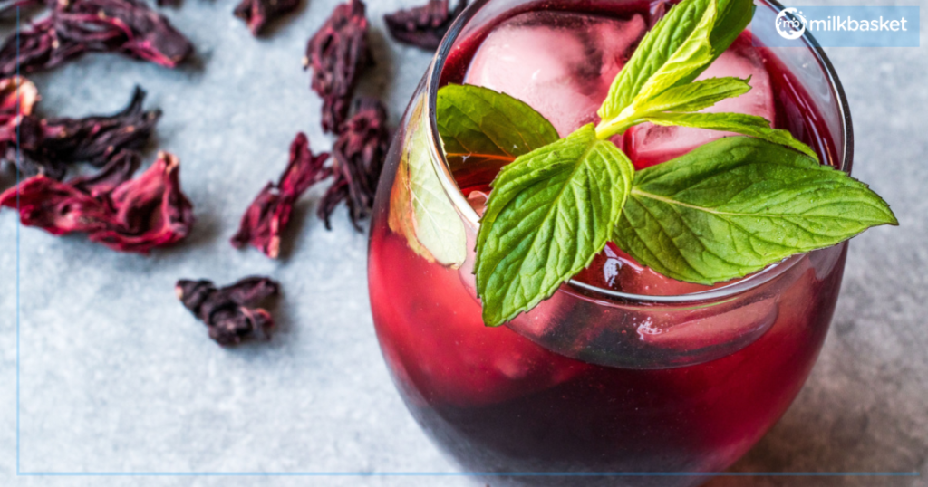 Cool off with a glass of red Hibiscus Iced Tea and fresh mint