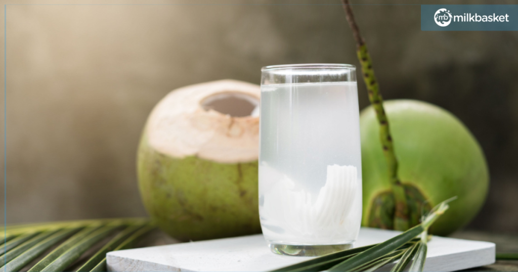 Coconut water in a glass, refreshing and hydrating tropical drink.

