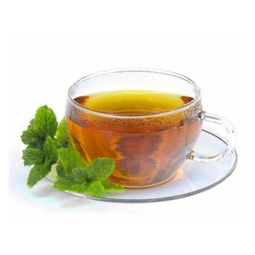 A clear glass cup containing amber-colored tulsi tea, garnished with fresh mint leaves.