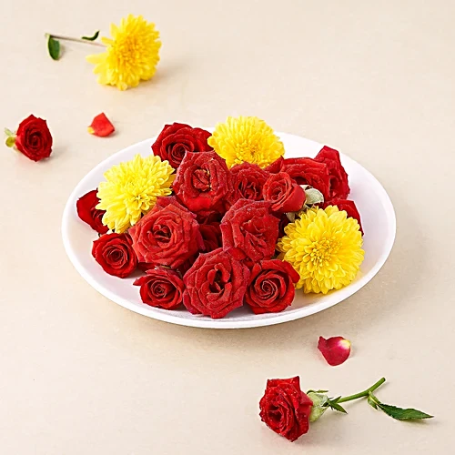 Marigold flowers, roses, and jasmine are essential components of any complete Janmashtami pooja list.